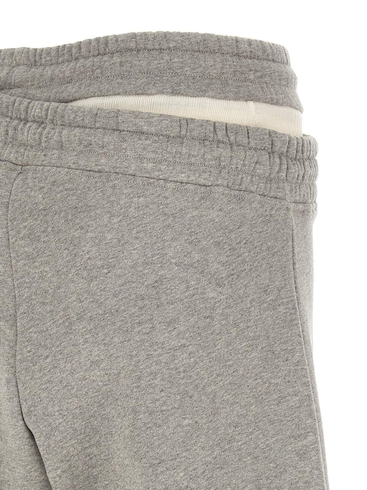 Asymmetrical double waist trousers 4