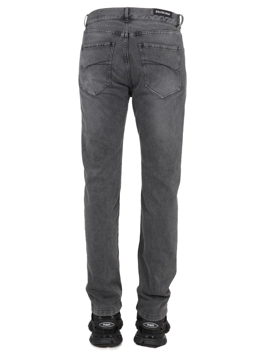 JEANS CON PATCH LOGO 4