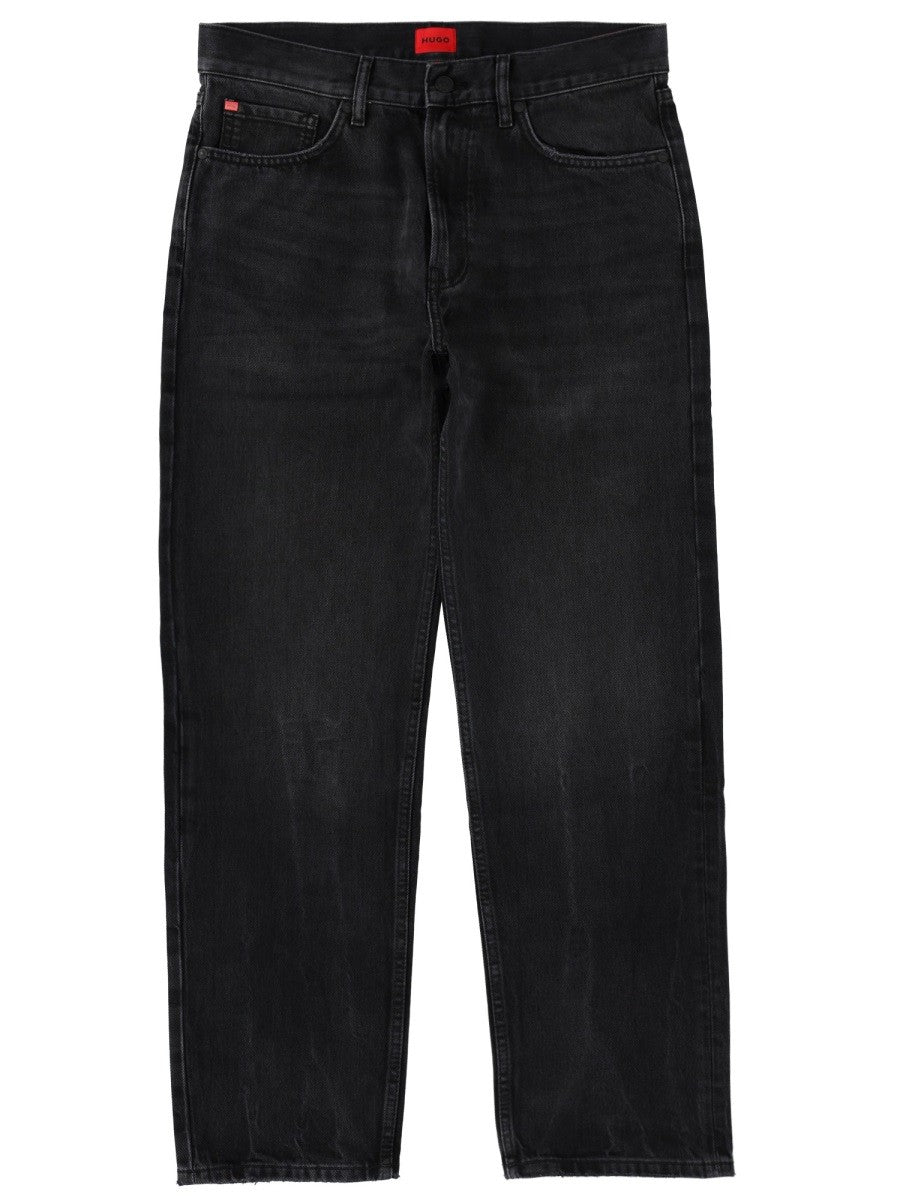 JEANS WITH LOGO PATCH