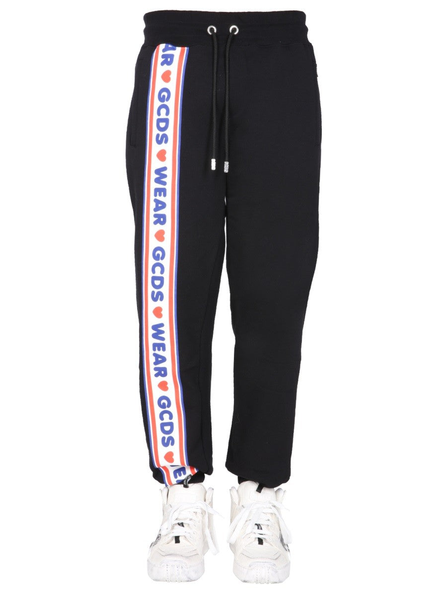 JOGGING PANTS WITH "CUTE TAPE" LOGO BAND