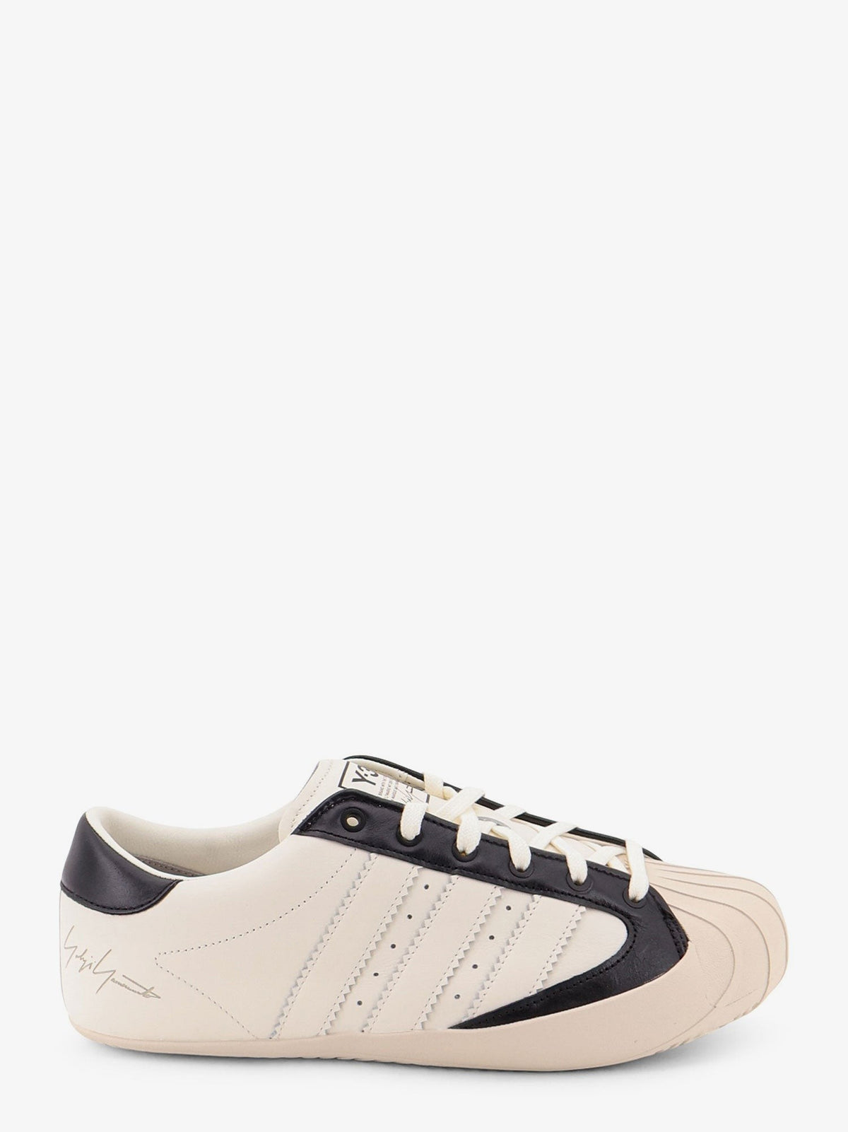 Leather and rubber sneakers