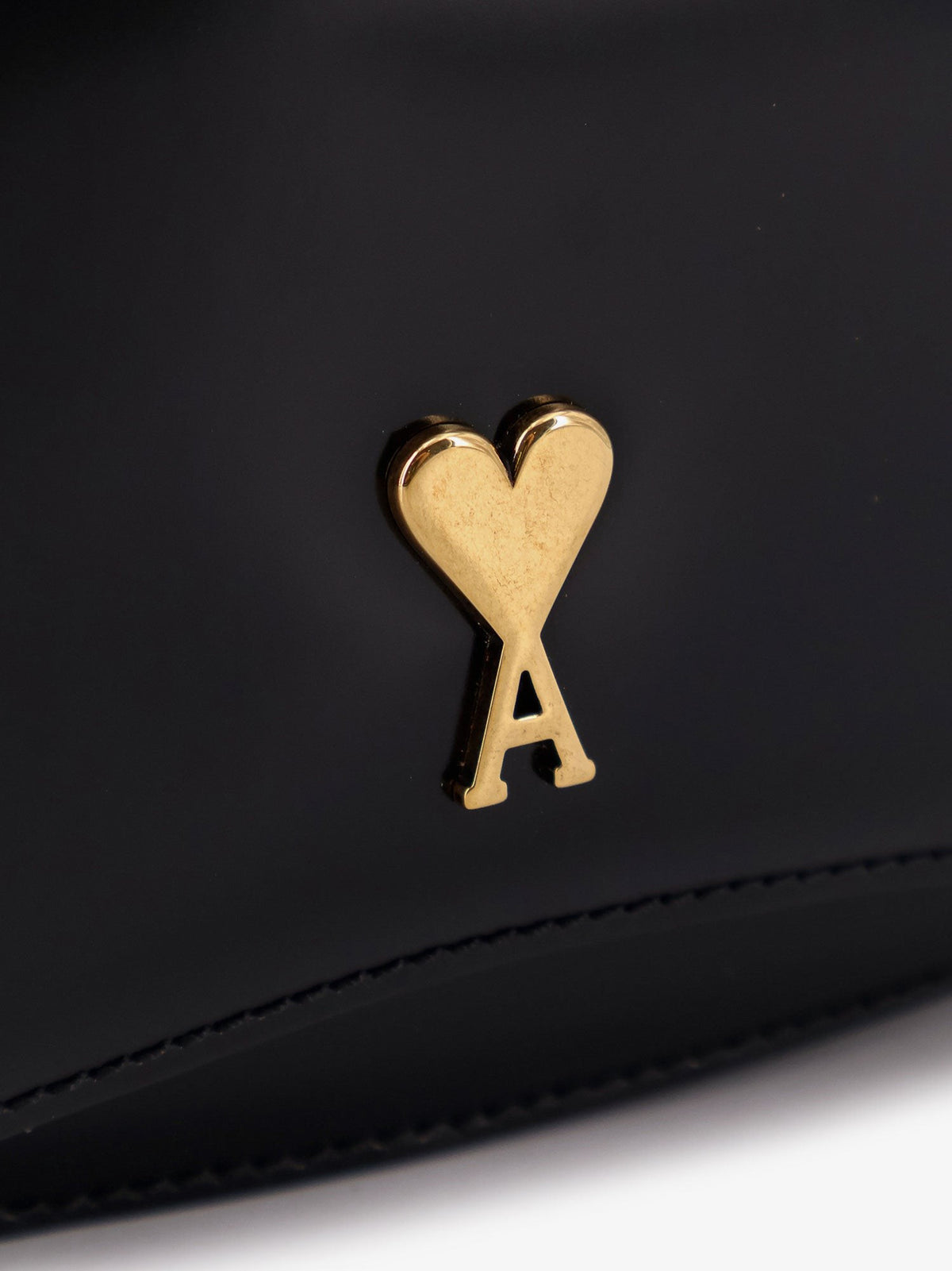 Leather shoulder bag with metal logo on the front 5