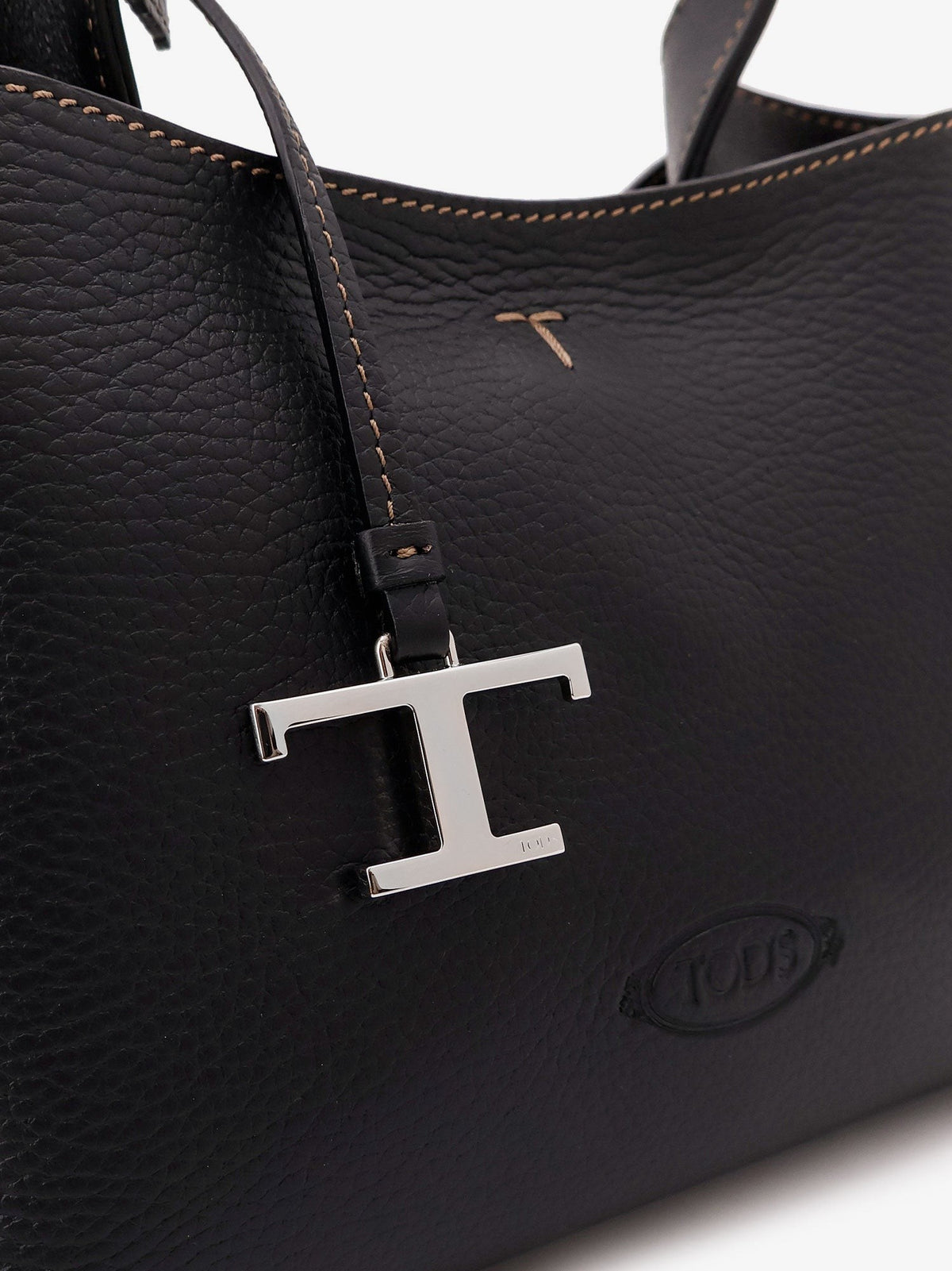 Micro leather crossbody bag with iconic stitching on the front 5