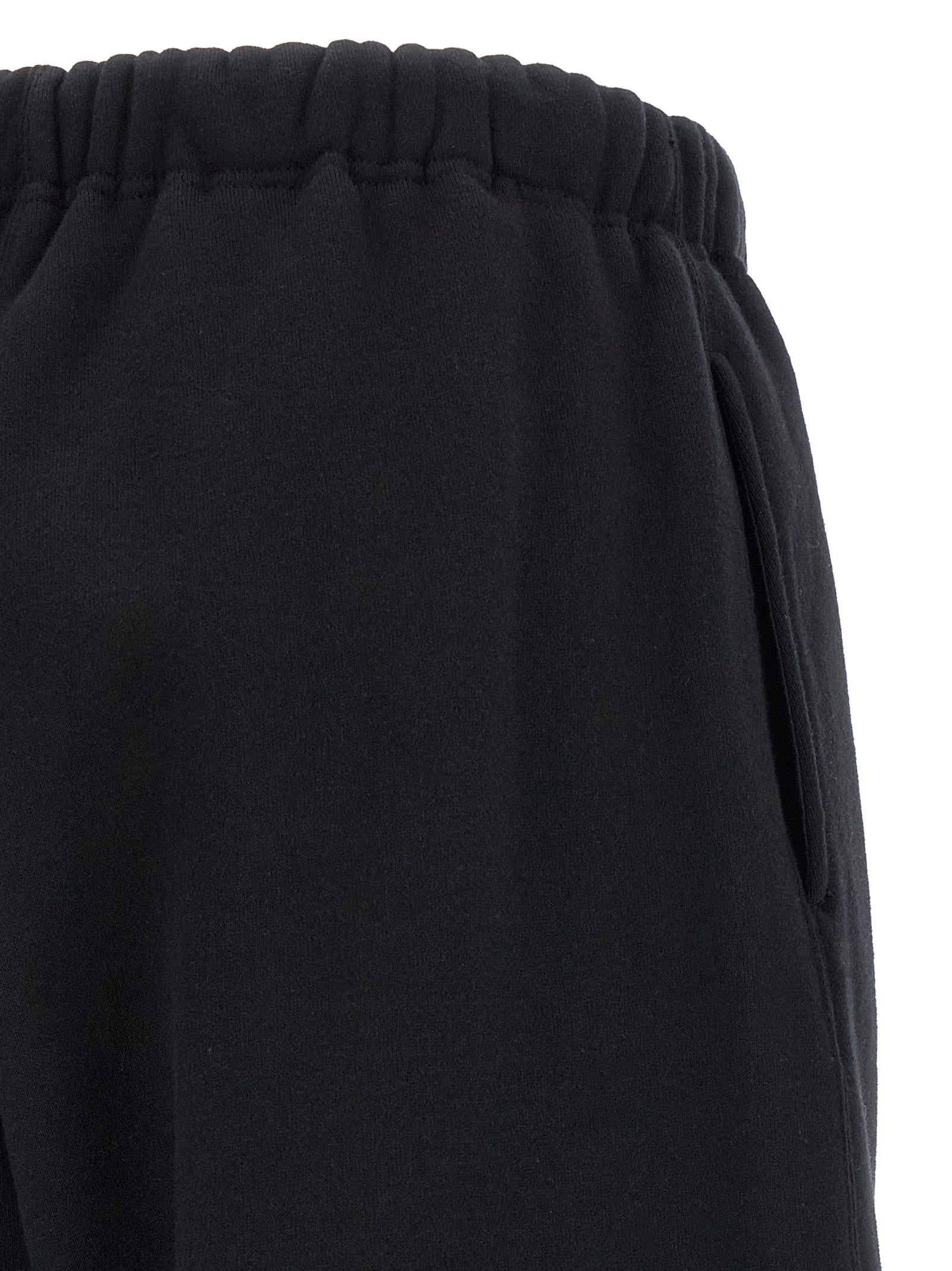 Cotton trousers with a layered trompe l'oeil design 4